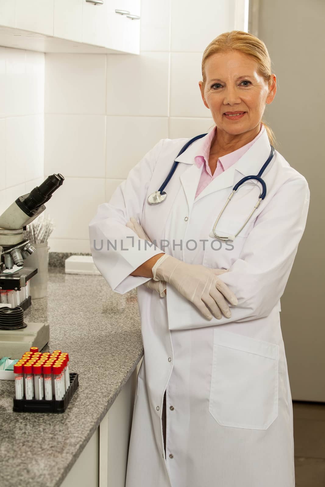 woman looking at the camara in a laboratory