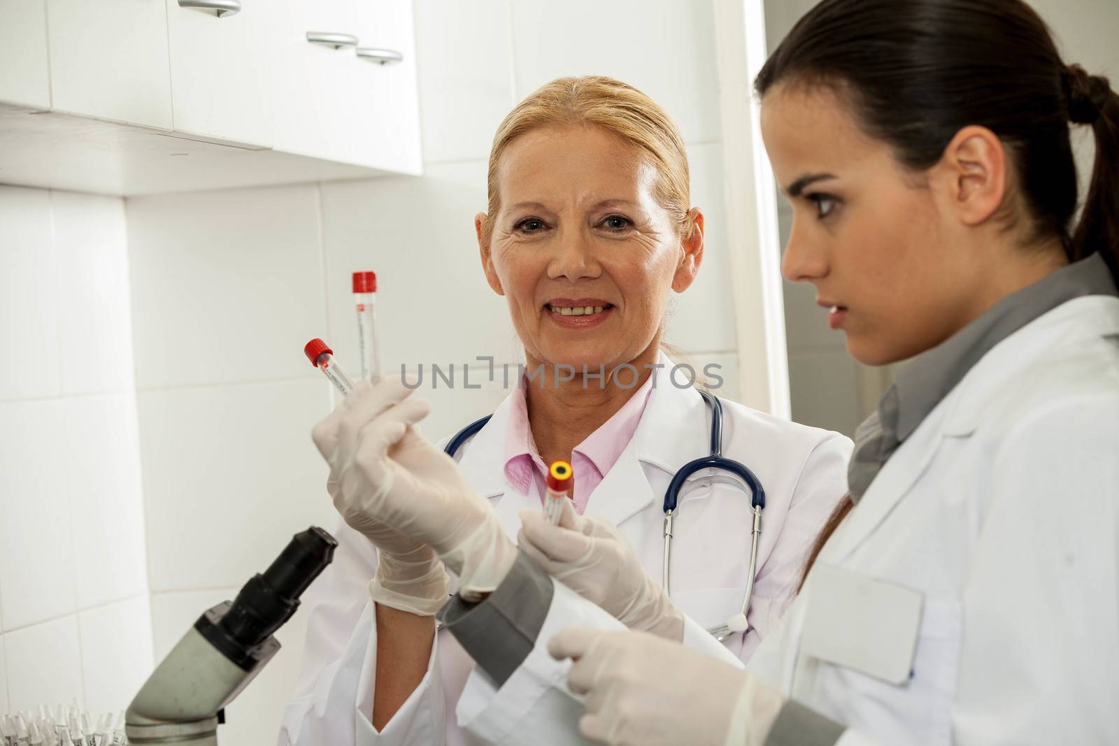 couple concentrated in a lab