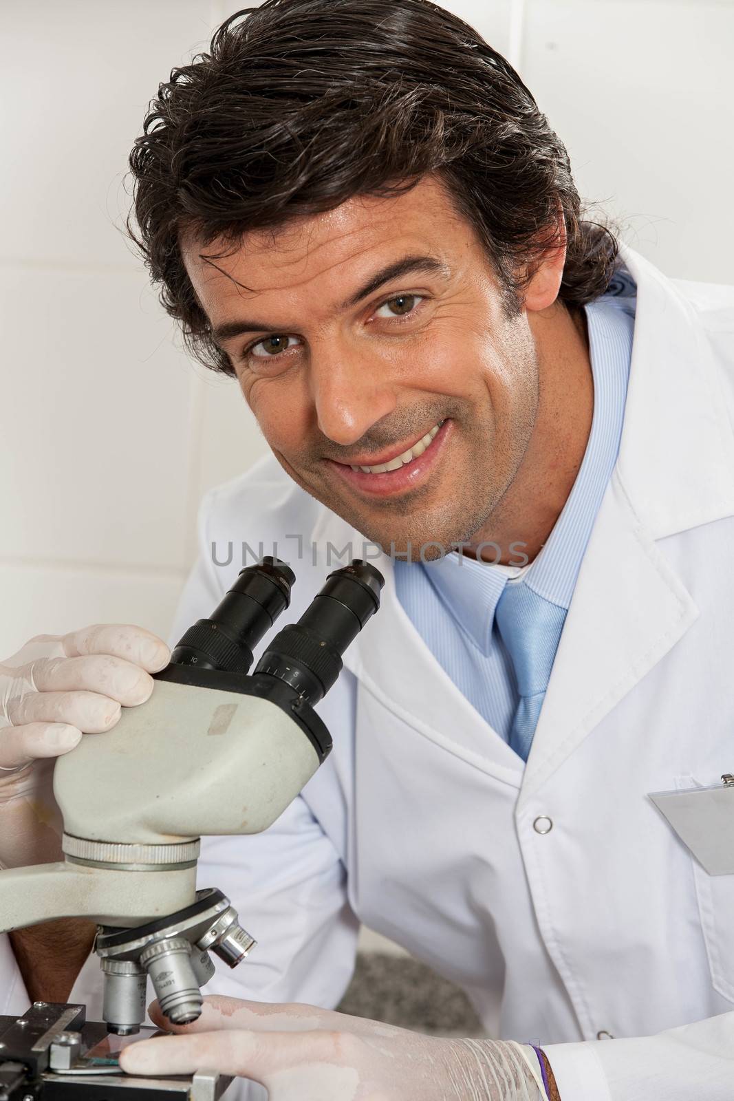 scientific smiling looking at the camera