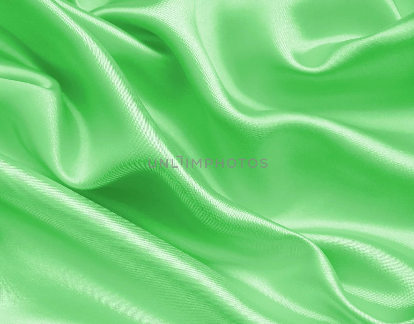 Smooth elegant green silk or satin can use as background 