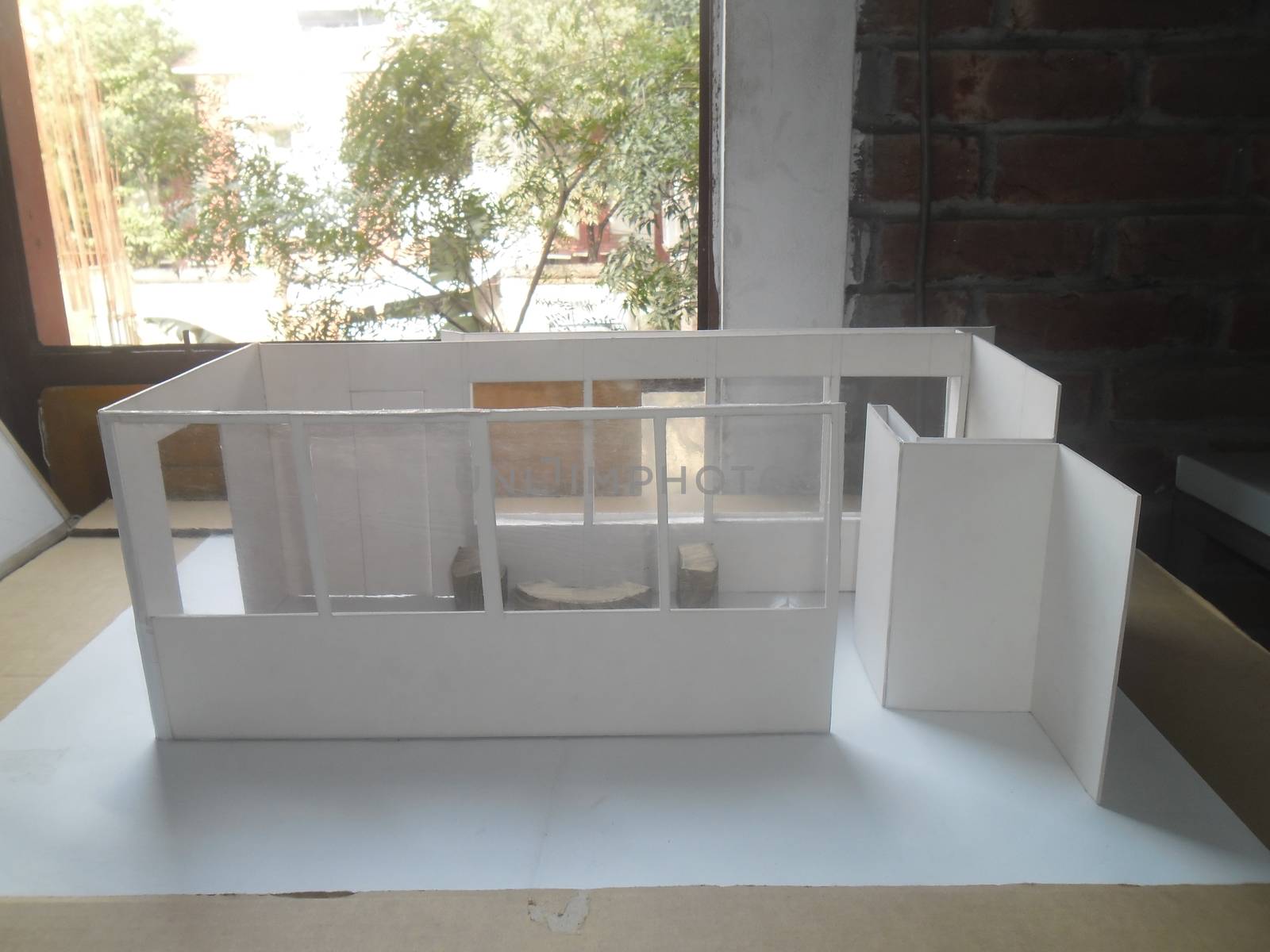 Architecture model with round seating space and large windows