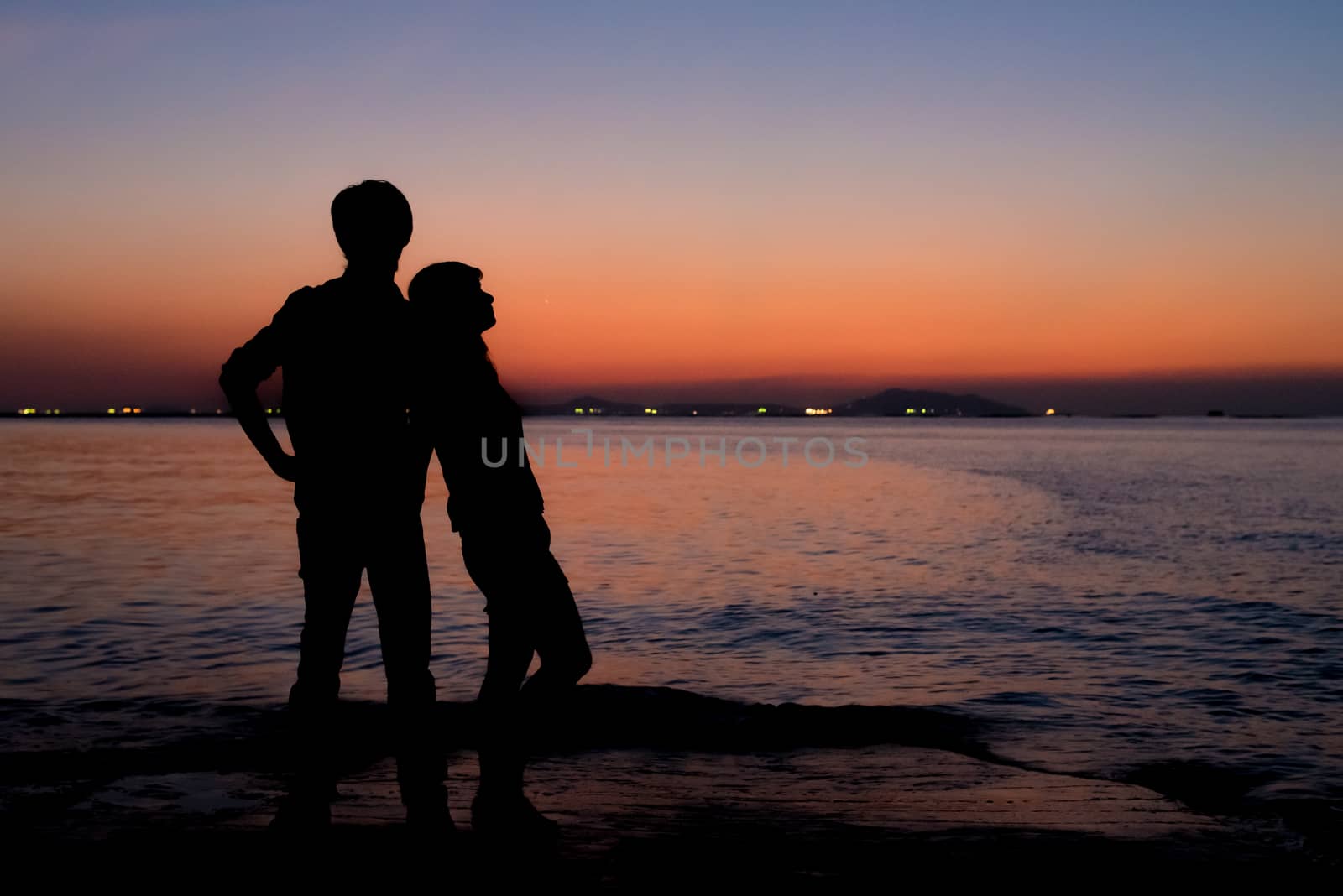 Silhouette of sweet couple with romantic place by pixbox77