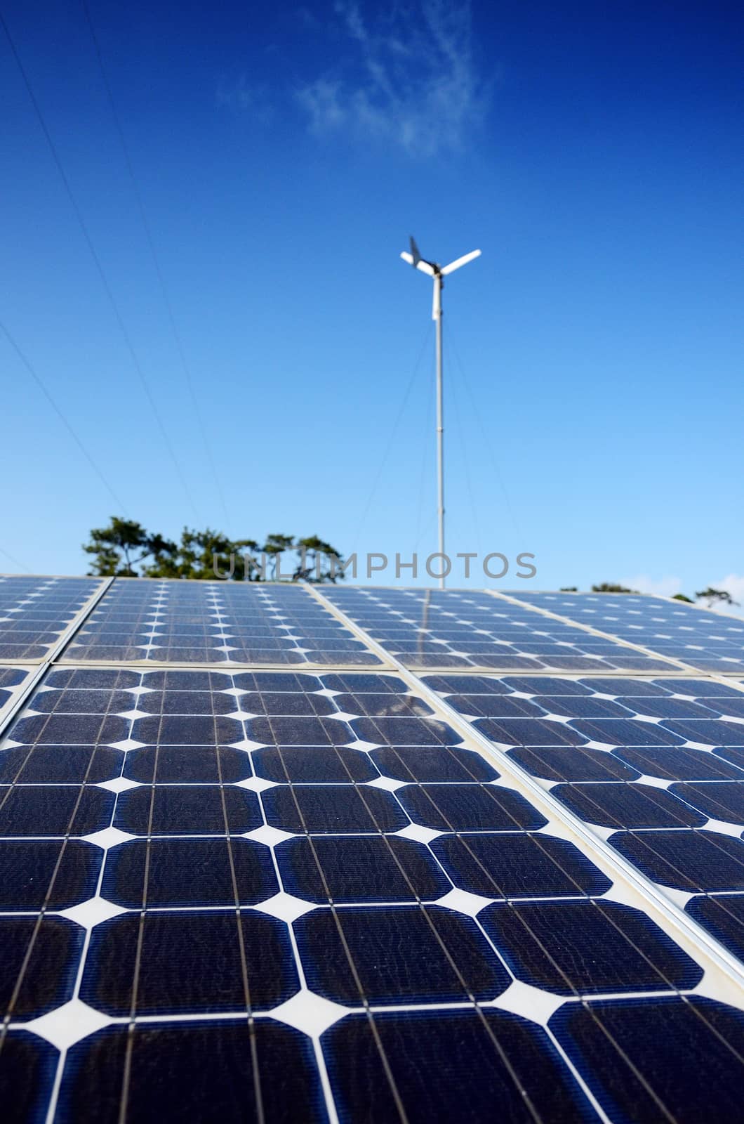 Solar cell panel in solar farm close up by pixbox77