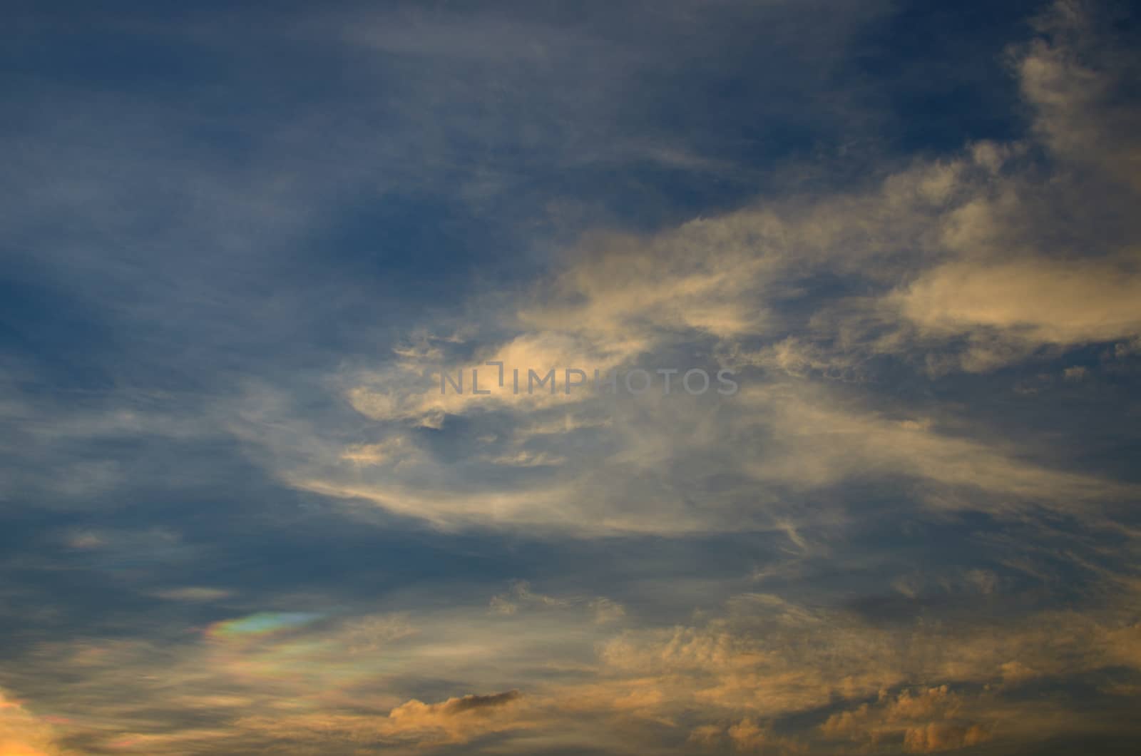 Sunset sky with Iridescence and cloud by pixbox77