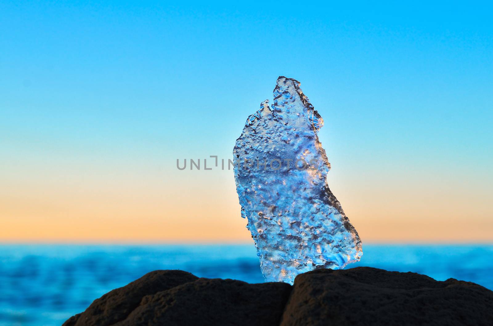 Piece of ice on the seashore