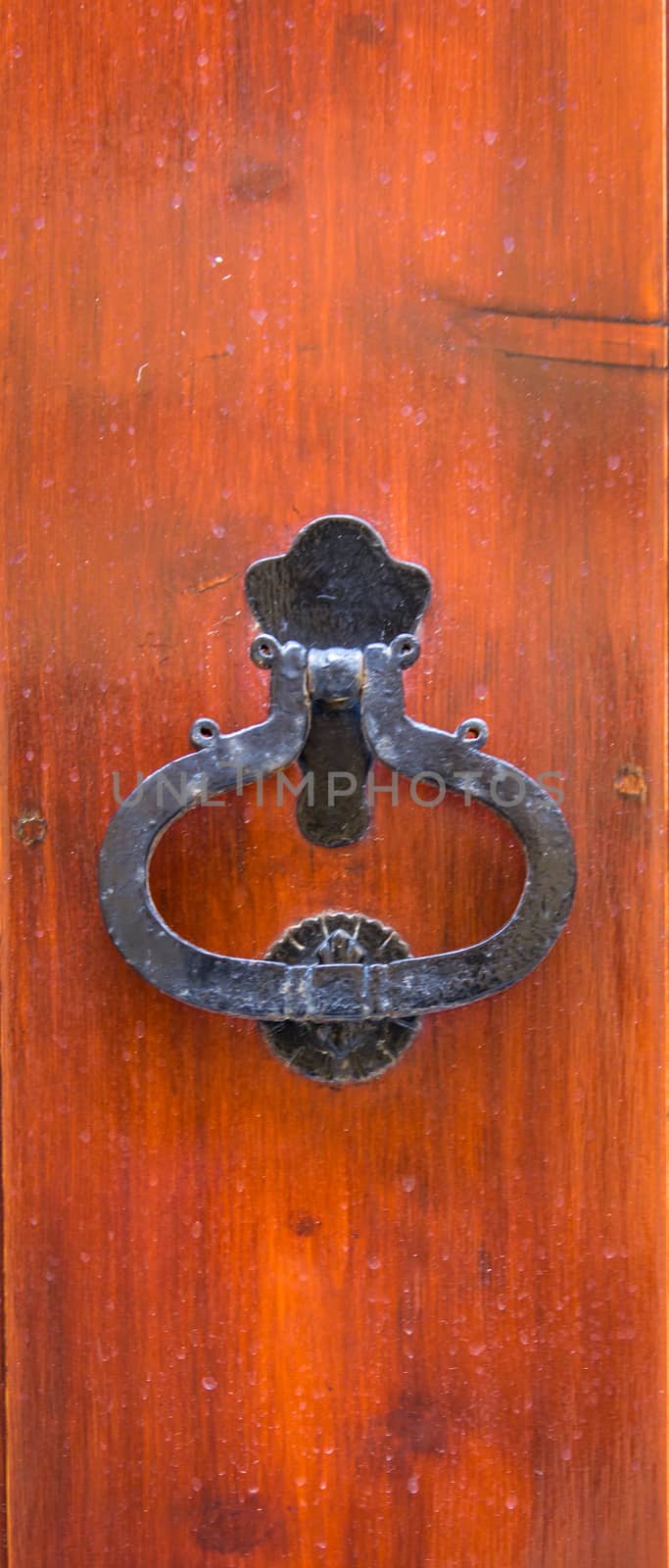 ornamental swing to knock on doors, used as the modern bells