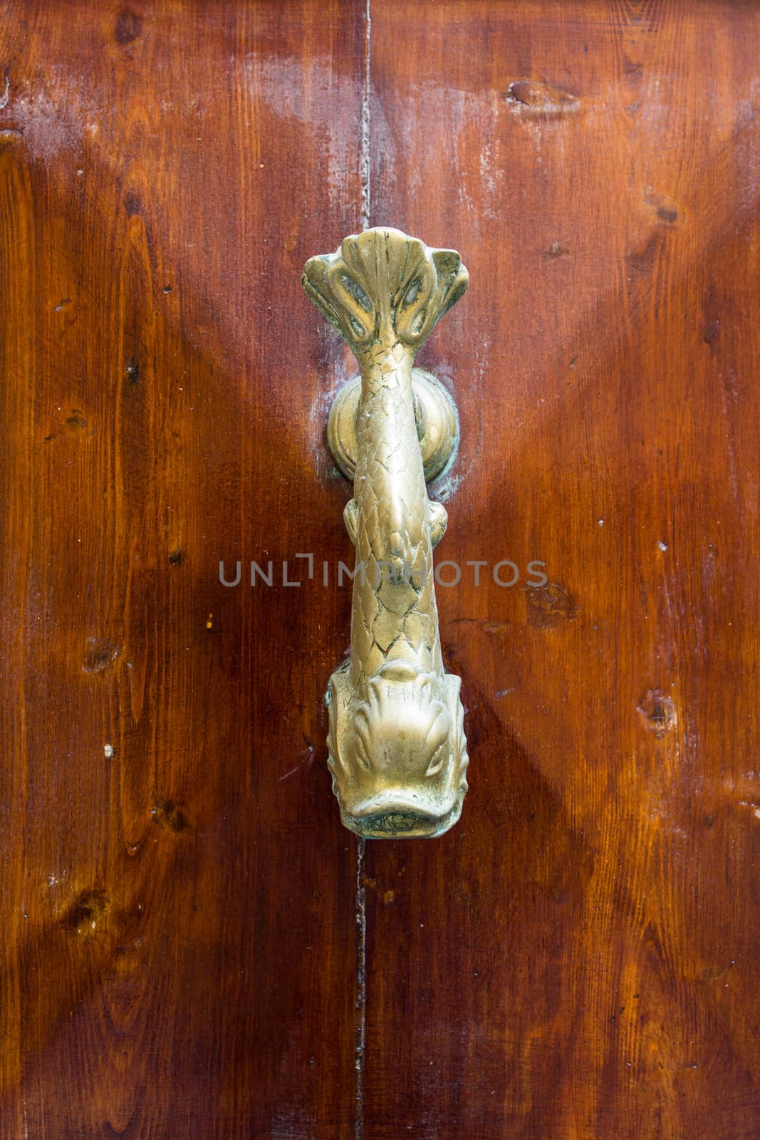 ornamental swing to knock on doors, used as the modern bells