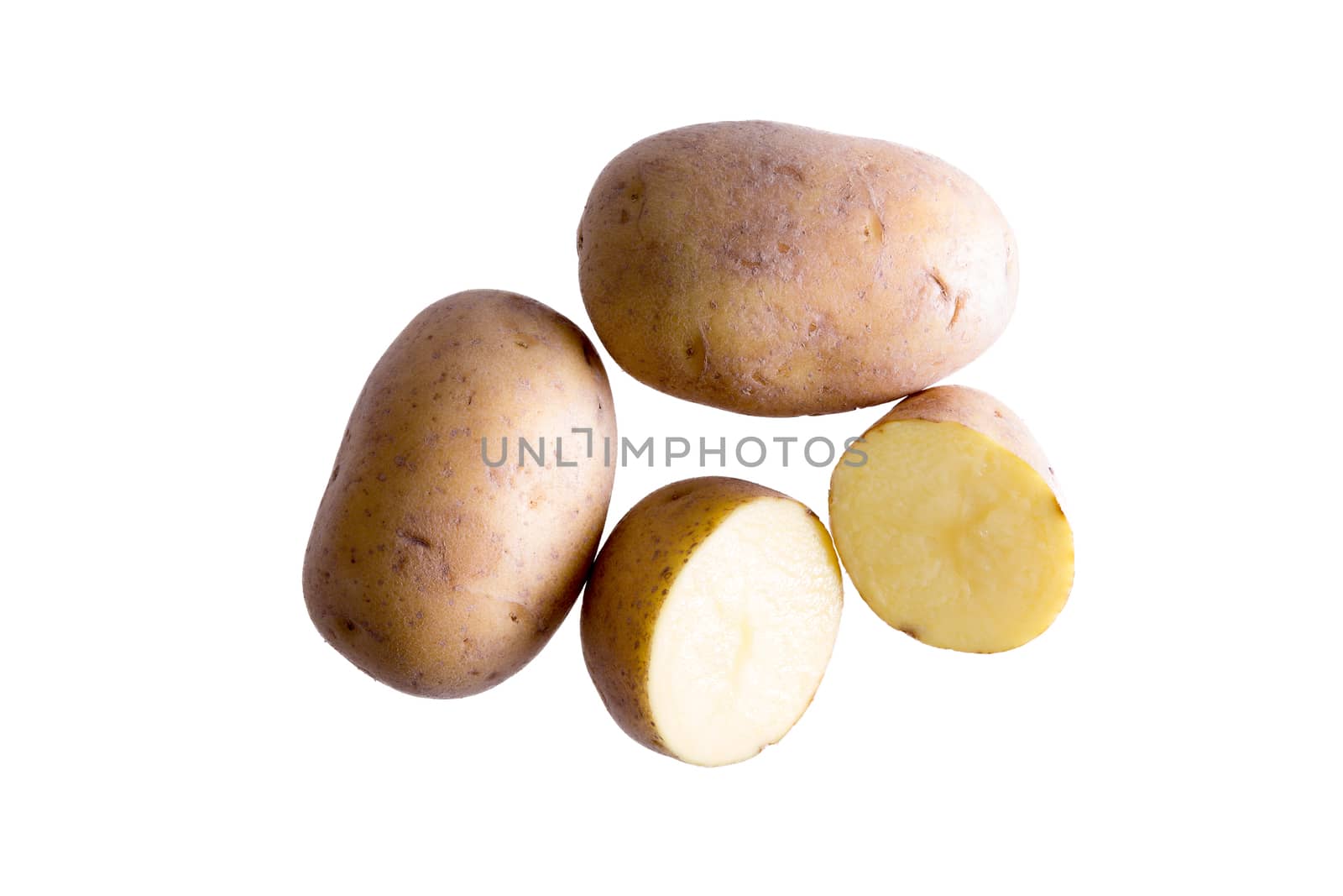 Still Life of Two Whole Golden Potatoes with One Cut in Half Isolated on White Background