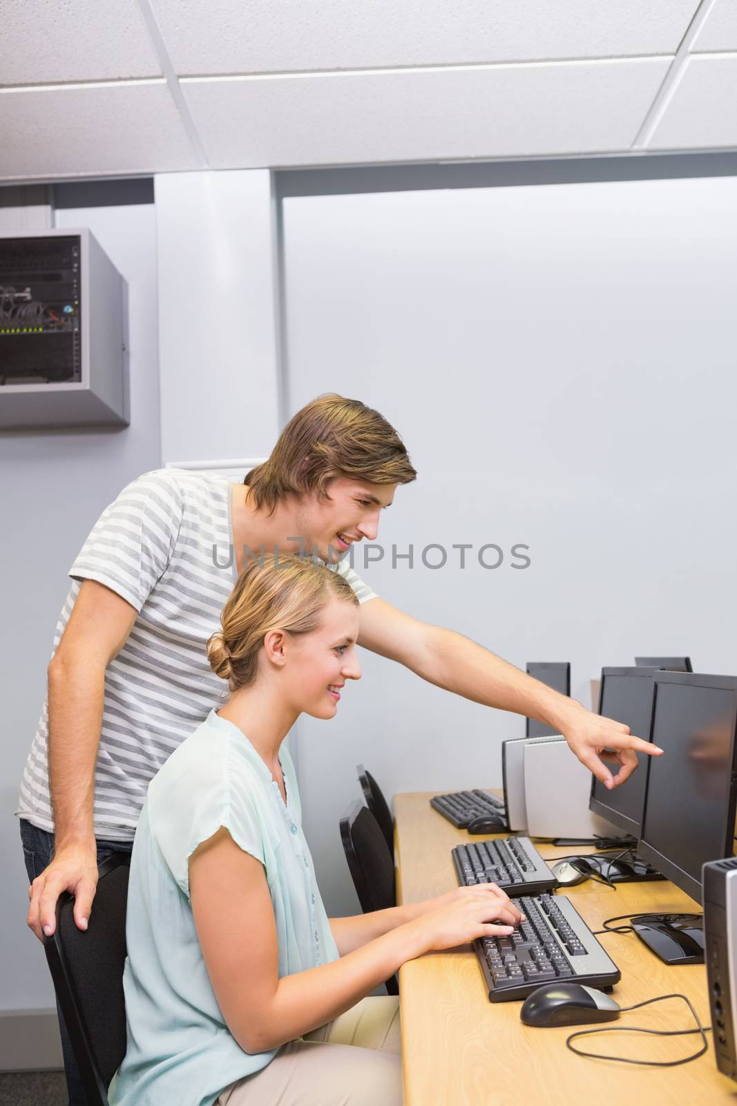Students working on computer in classroom at the university