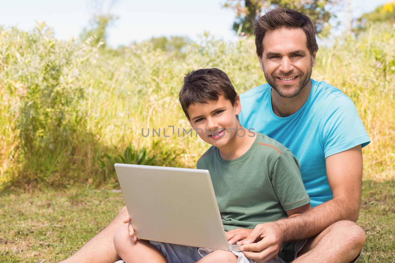 Father and son in the countryside on a sunny day