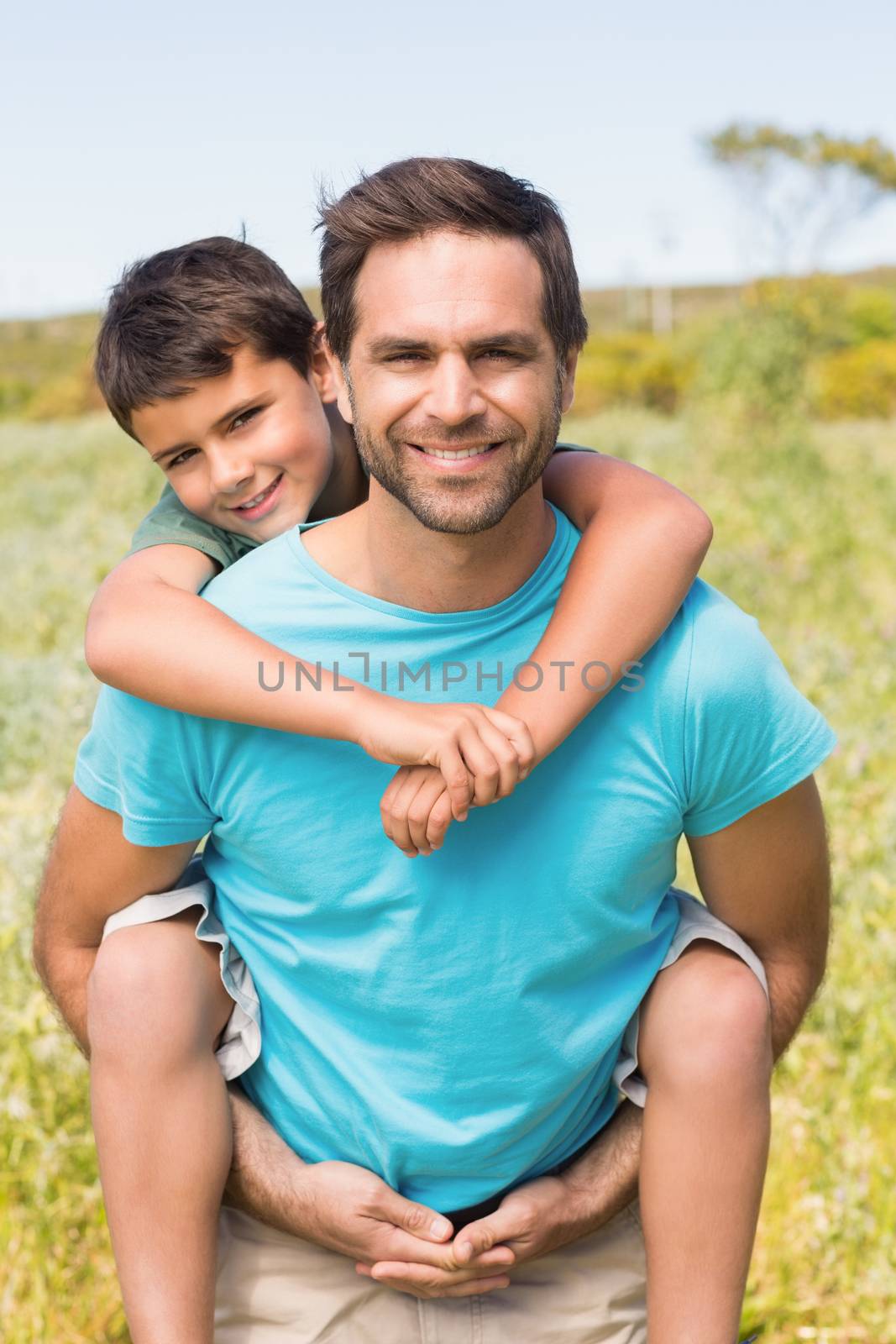 Father and son in the countryside on a sunny day