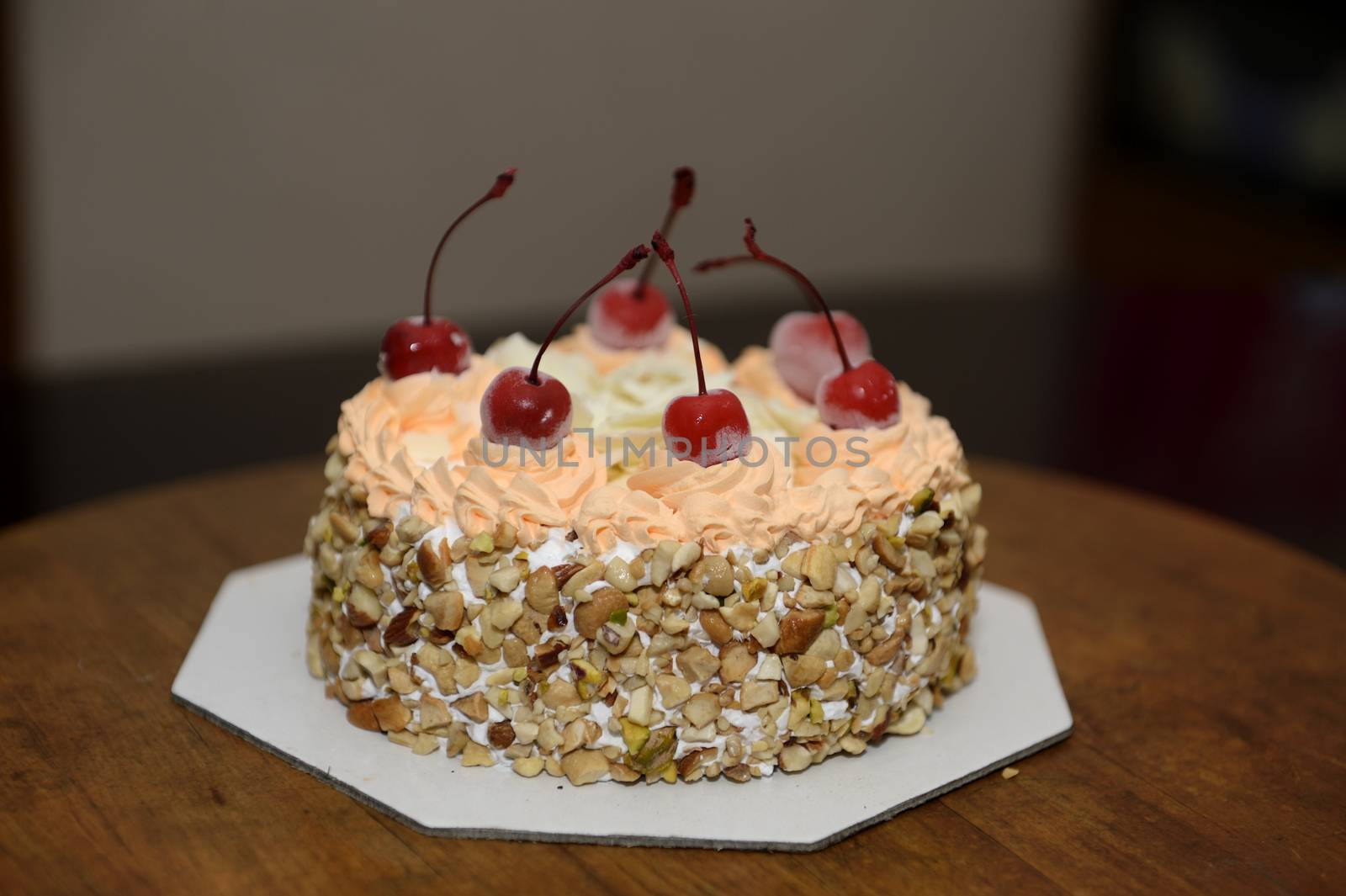 A pretty cake isolated on a dinner table