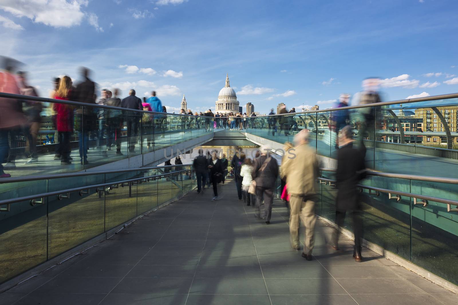 Blurred motion view over the Millennium footbridge looking towards St. Paul's Cathedral