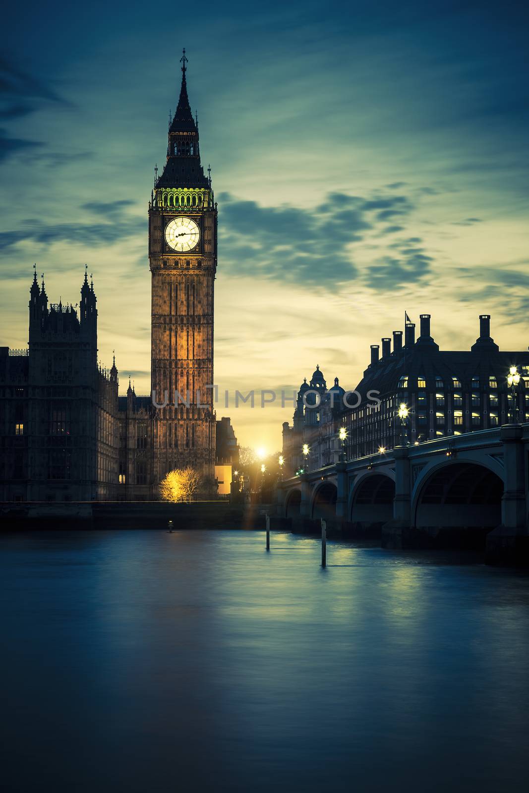 Famous Big Ben clock tower in London at sunset, special photographic processing.