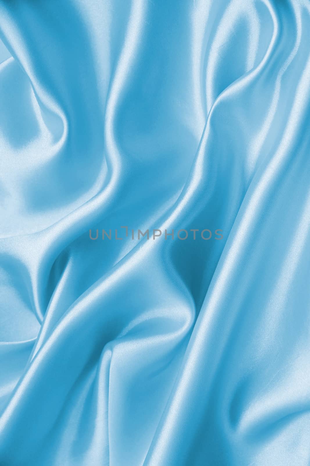 Smooth elegant blue silk or satin can use as background 