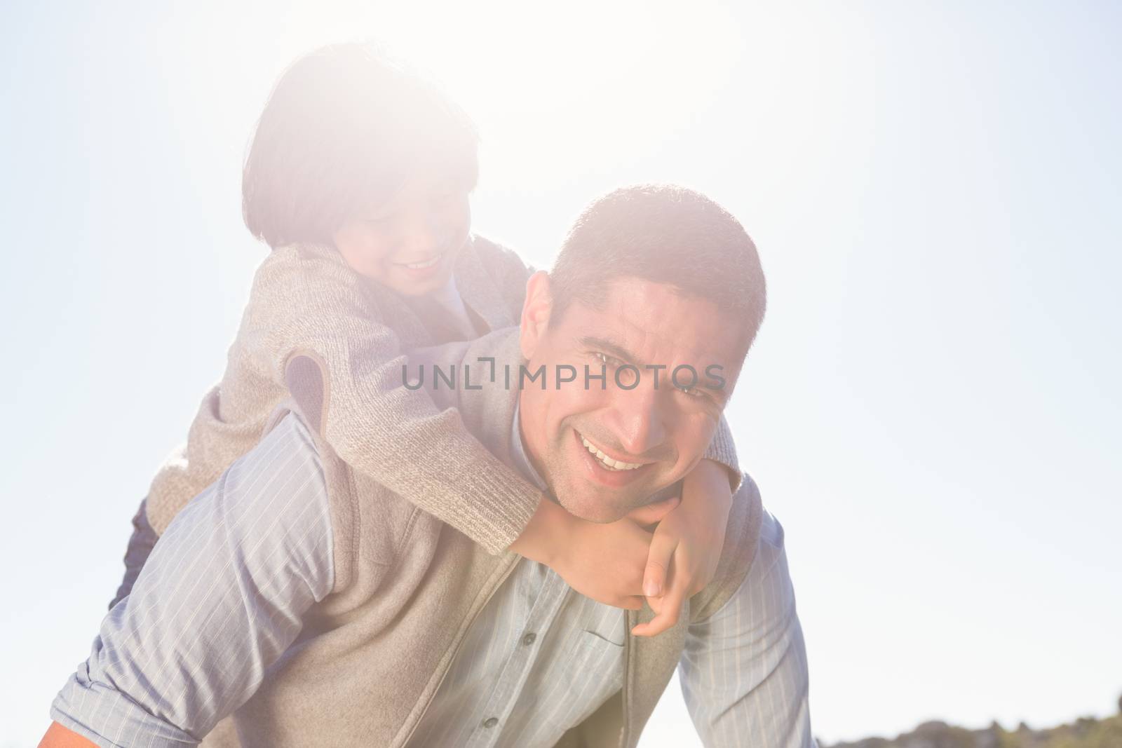 Father and son in the countryside on a sunny day