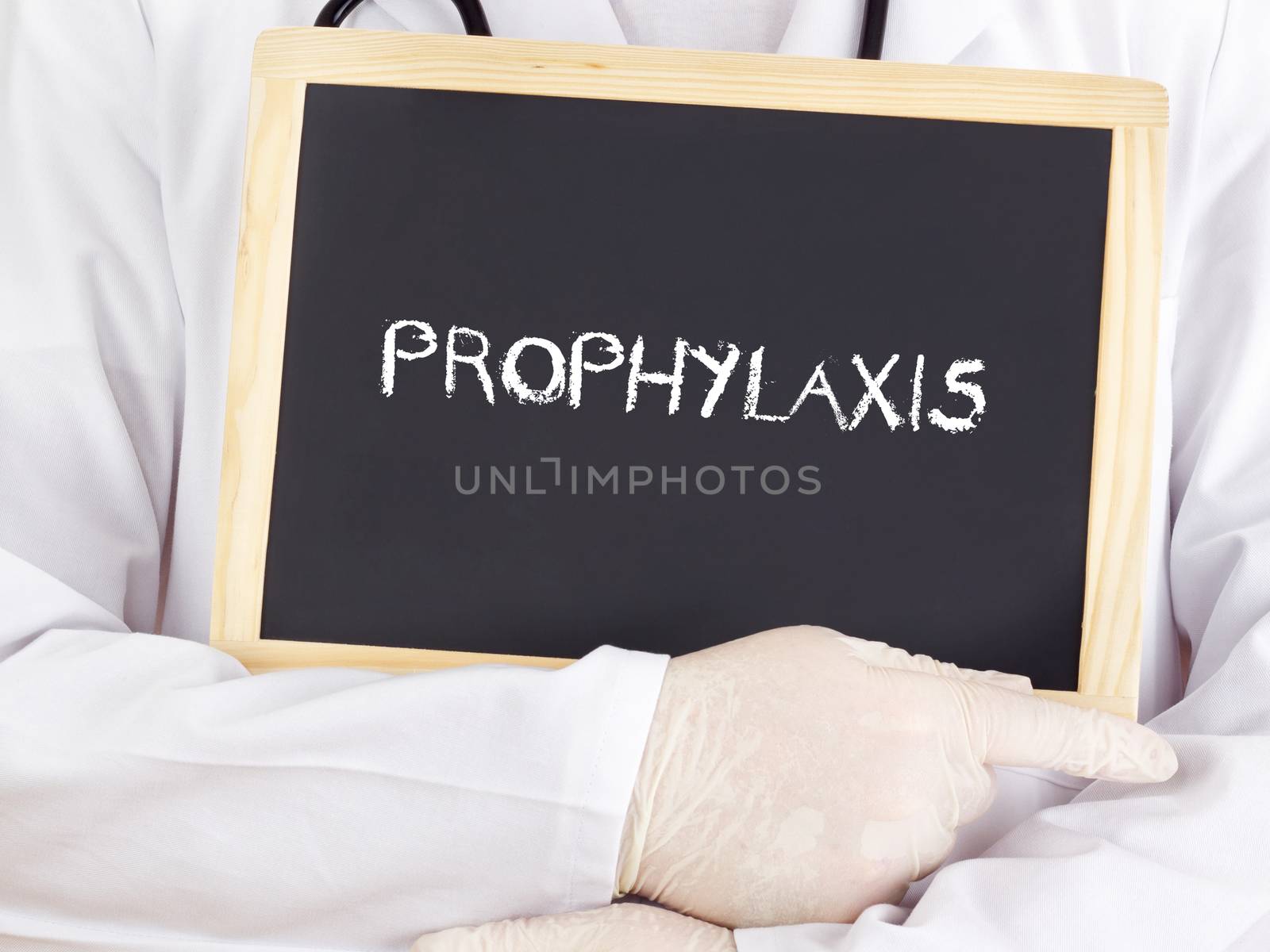 Doctor shows information on blackboard: prophylaxis by gwolters