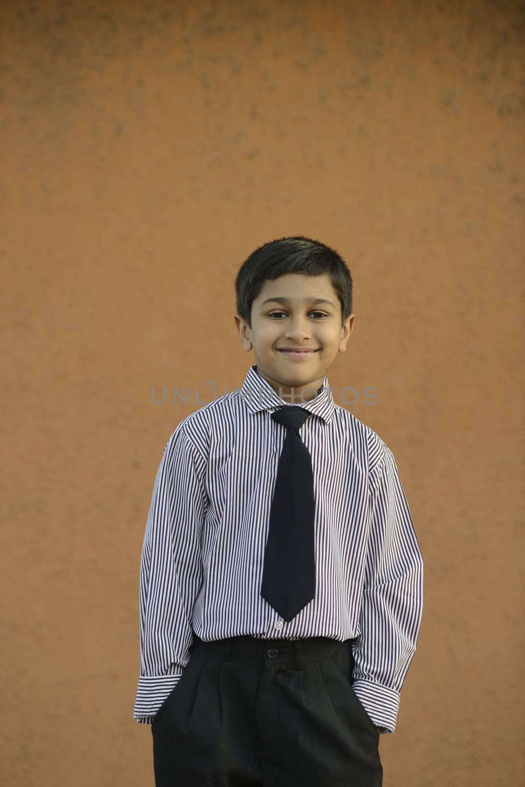 Handsome Indian toddler ready to go to school