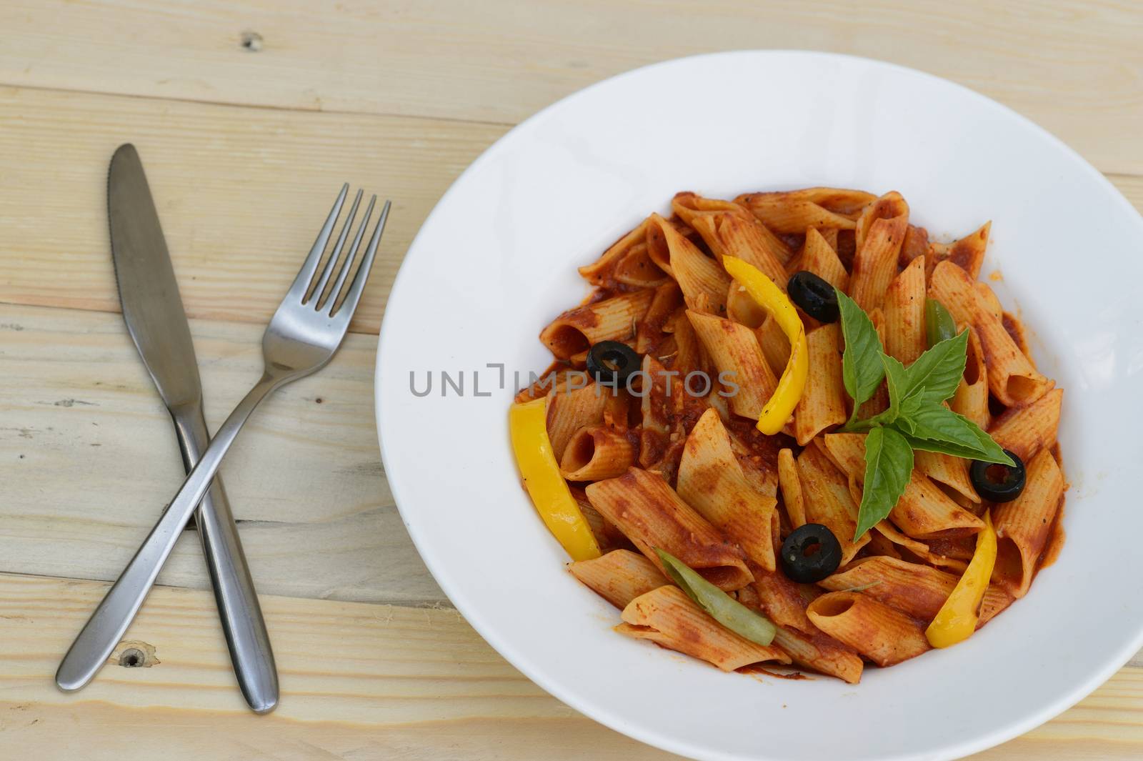 Close up photo of Pasta and spoon and fork