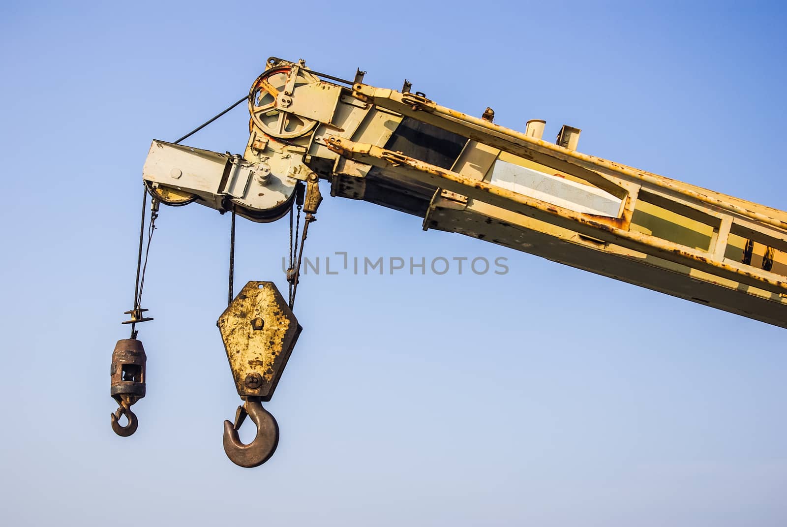 Big crane with blue sky background