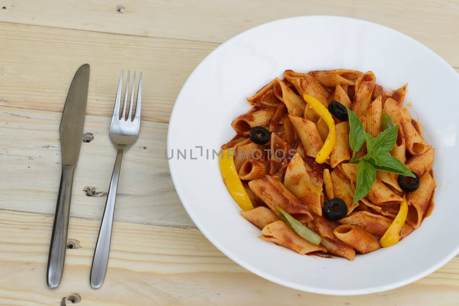 Close up photo of Pasta and spoon and fork