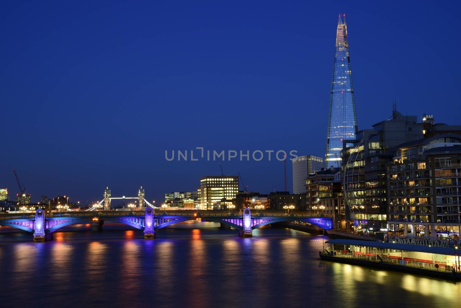 New London city hall at night , panoramic view from river.