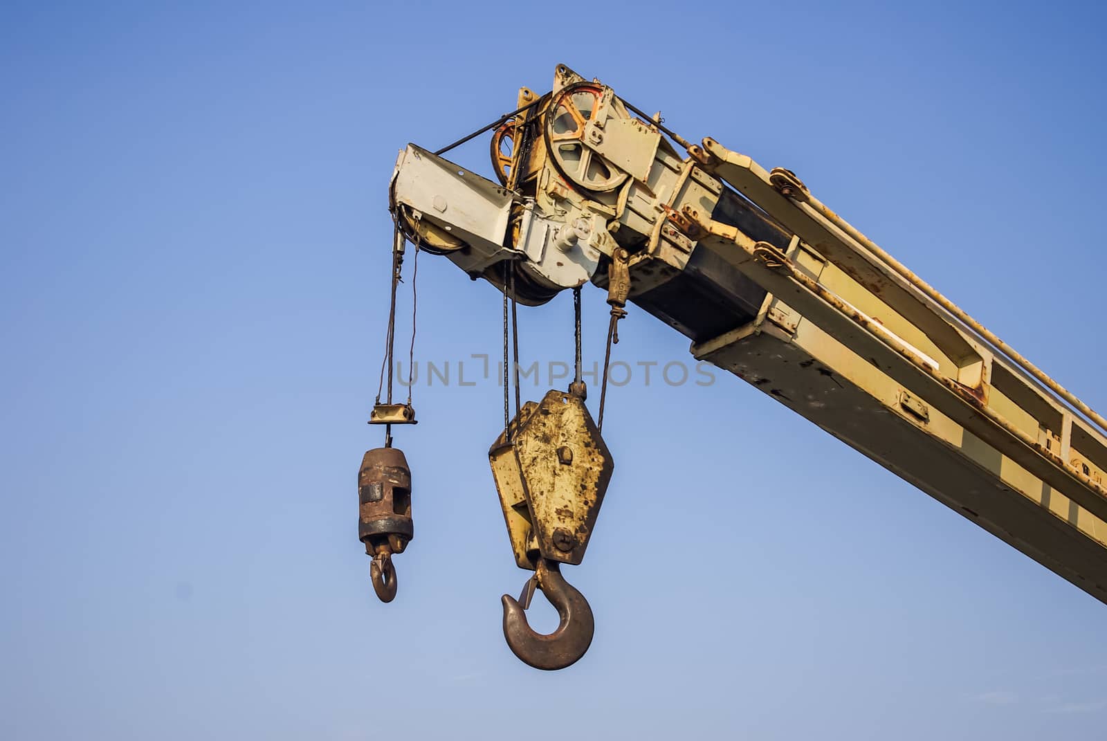 Big crane with blue sky background