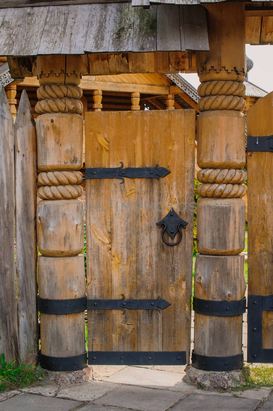 Old wooden barn door by timonko