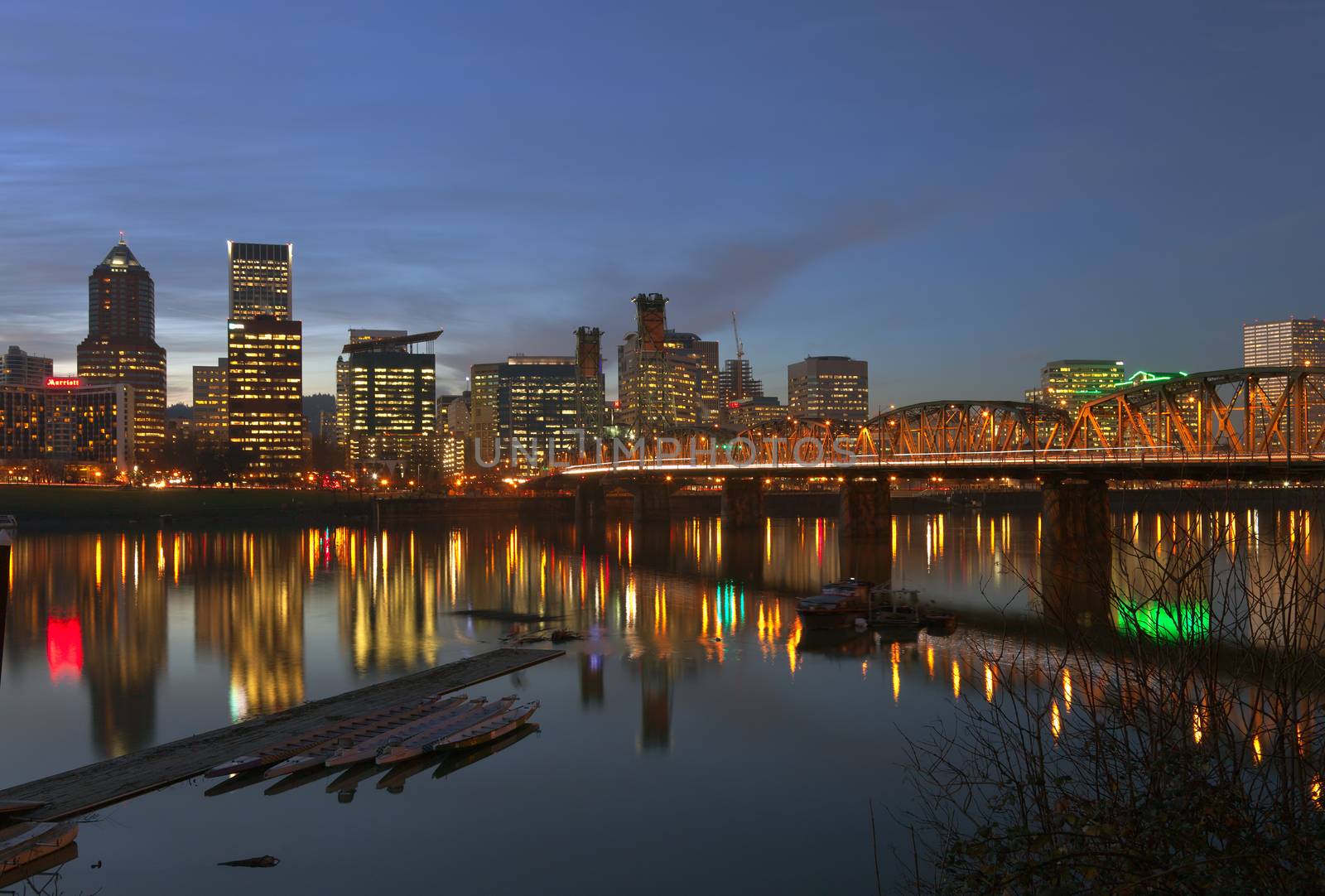 Portland Oregon downtown buildings blue hour lights.