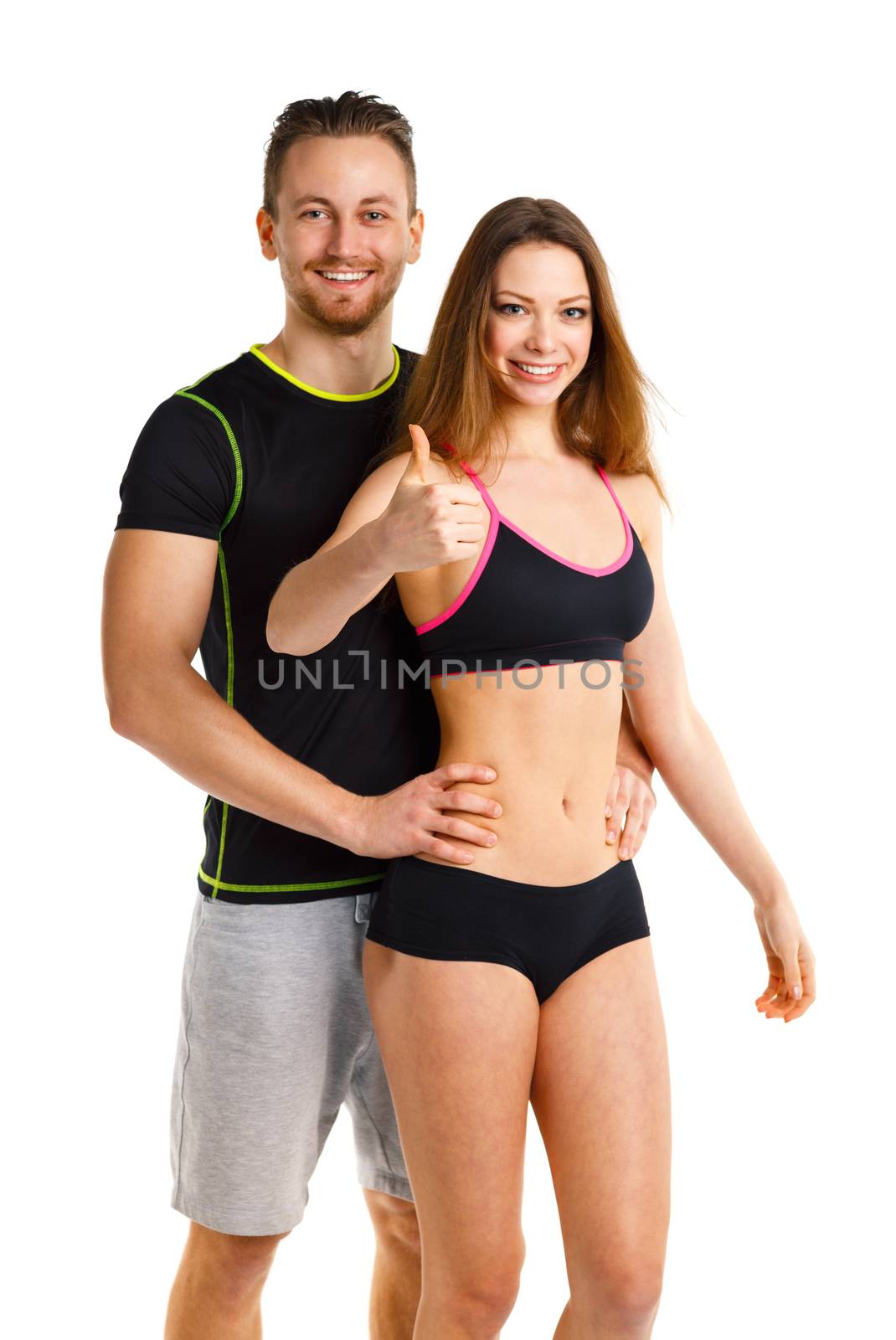 Athletic man and woman after fitness exercise with a finger up on the white background