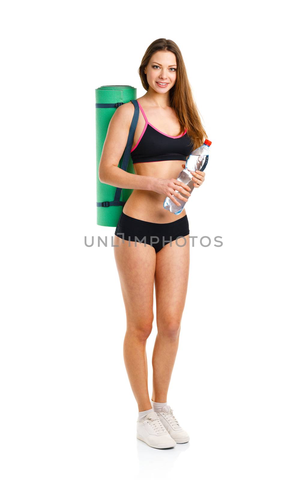 Beautiful athletic woman with mat for fitness and bottle of wate by vlad_star