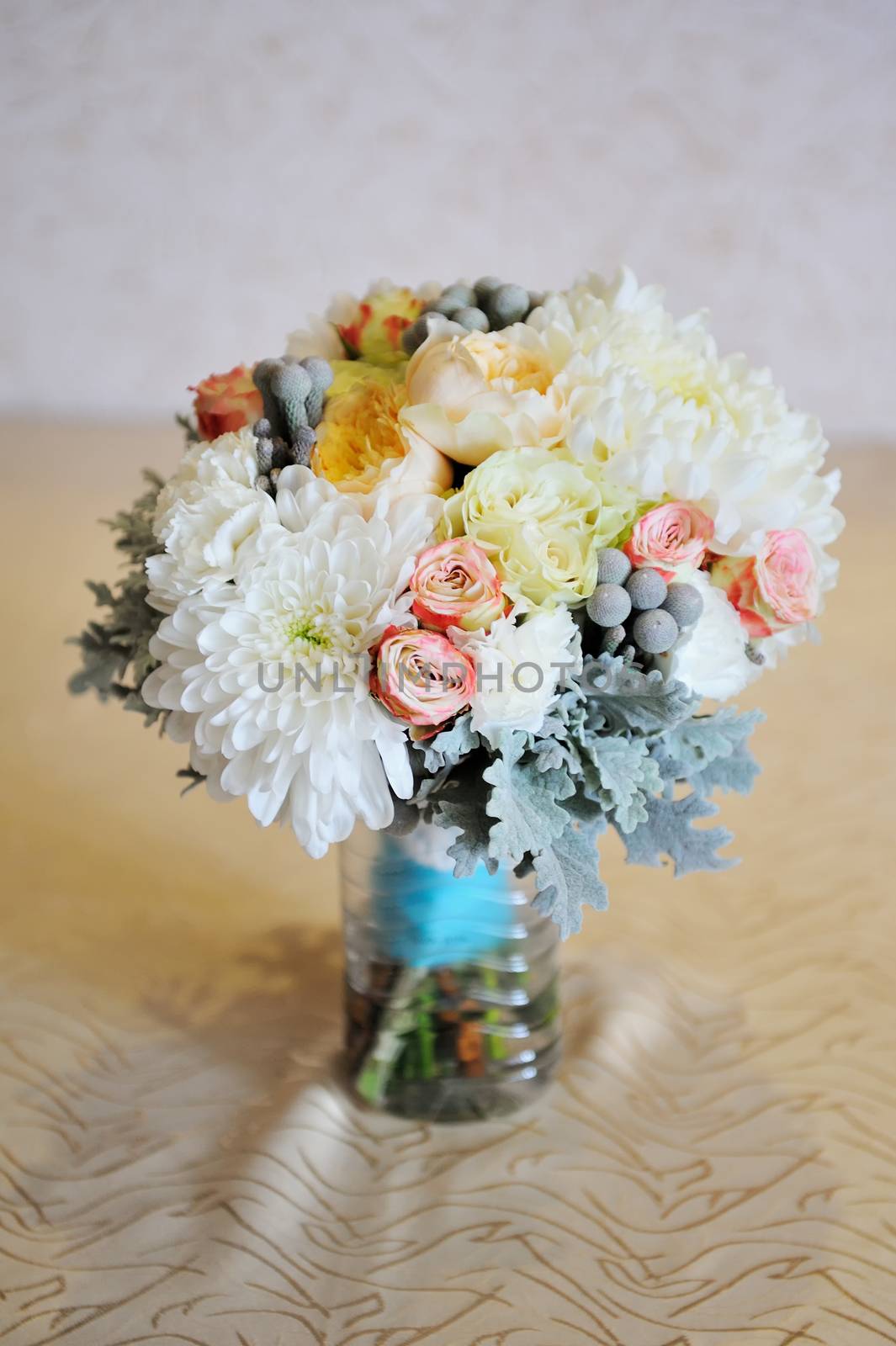 bridal bouquet is on the table.