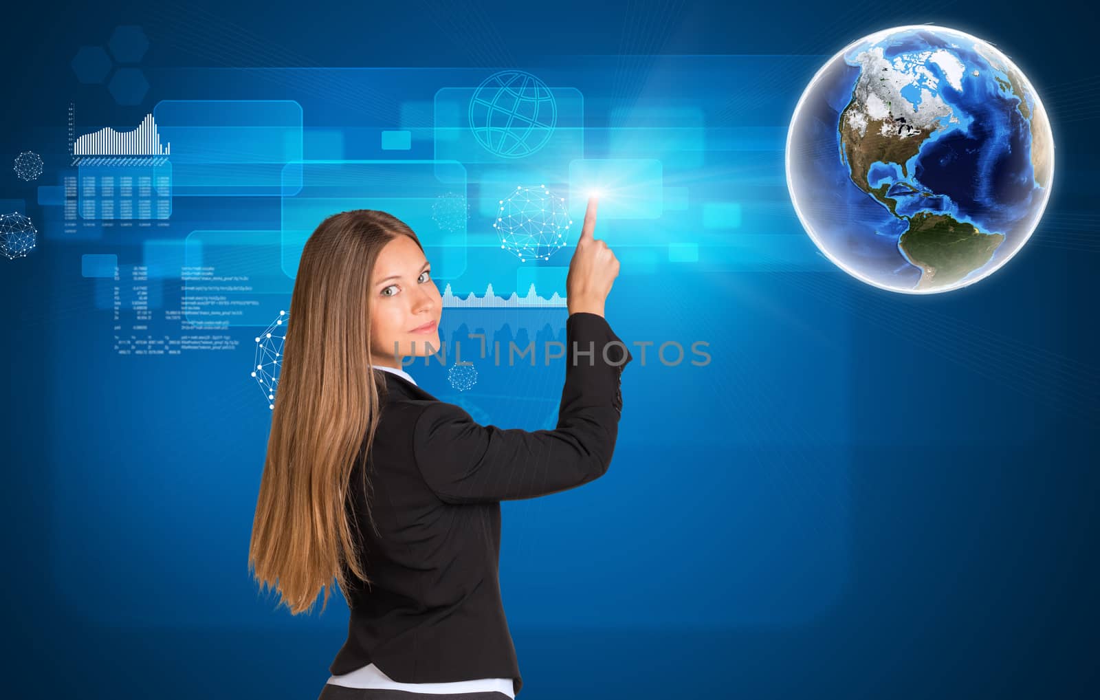 Businesswoman standing back and looking at camera pressing on holographic screen with graphical charts. Earth in upper right corner. Elements of this image furnished by NASA