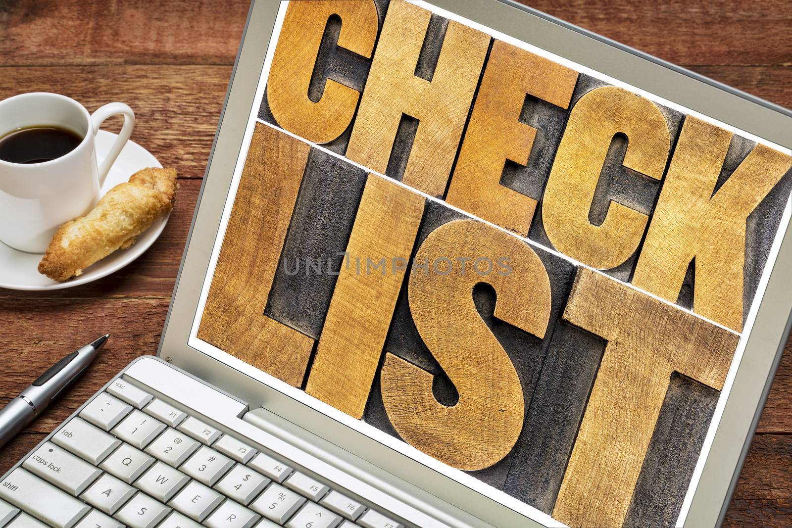 checklist word typography on laptop by PixelsAway