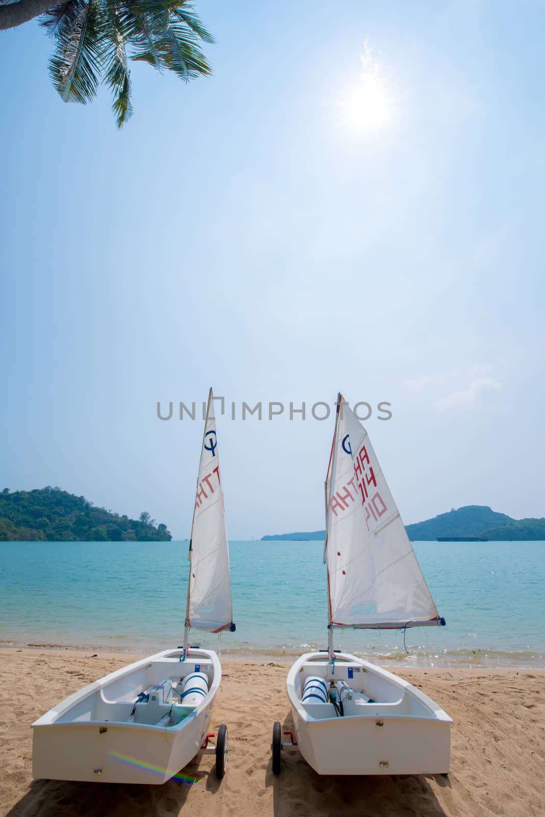 sailboats on beach by antpkr