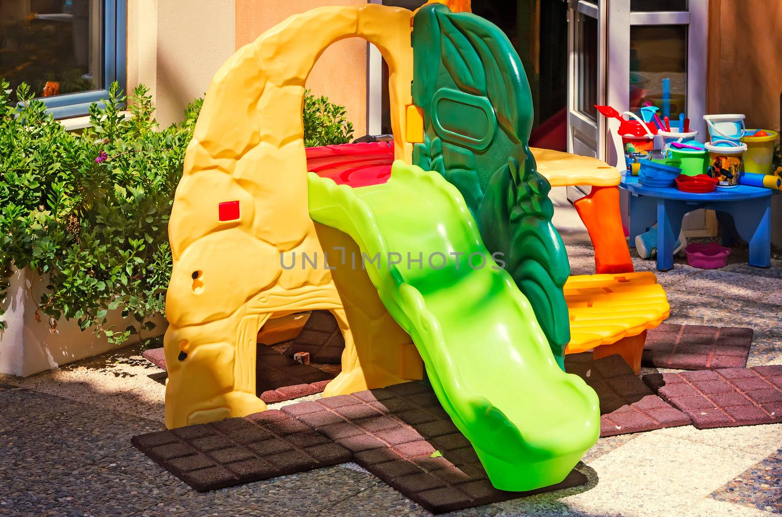 Children's Playground with many attractions on the beach in the resort.