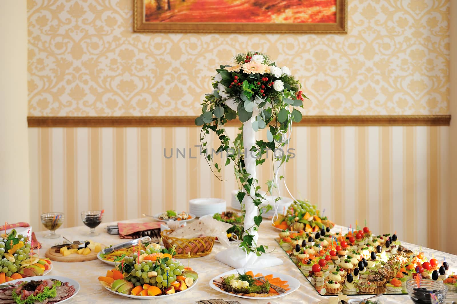 table set for wedding dinner decorated with flowers by timonko