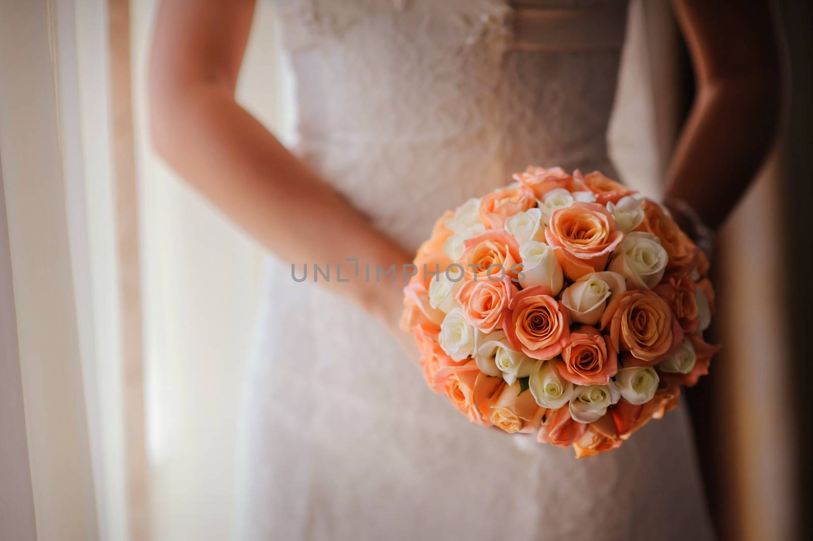 bride holding a wedding bouquet with white and pink roses by timonko