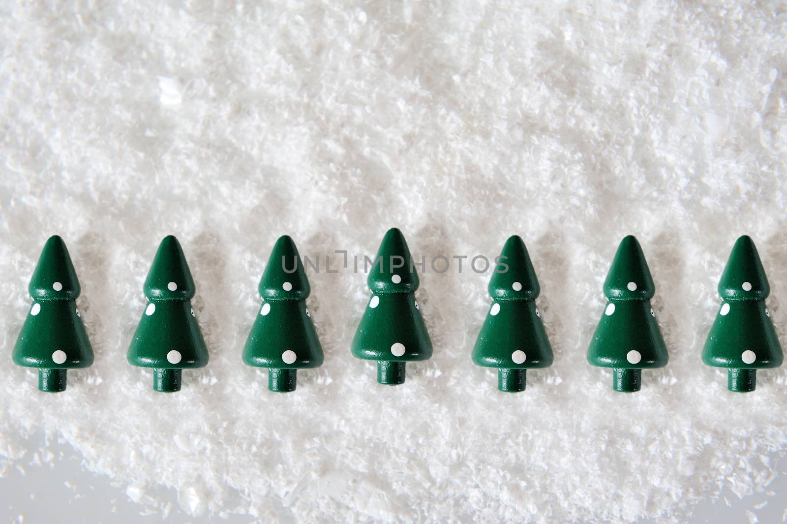 Miniature Christmas Trees on snow