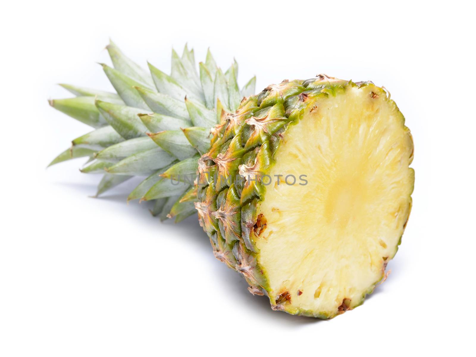 Fresh slice pineapple on white background by comet