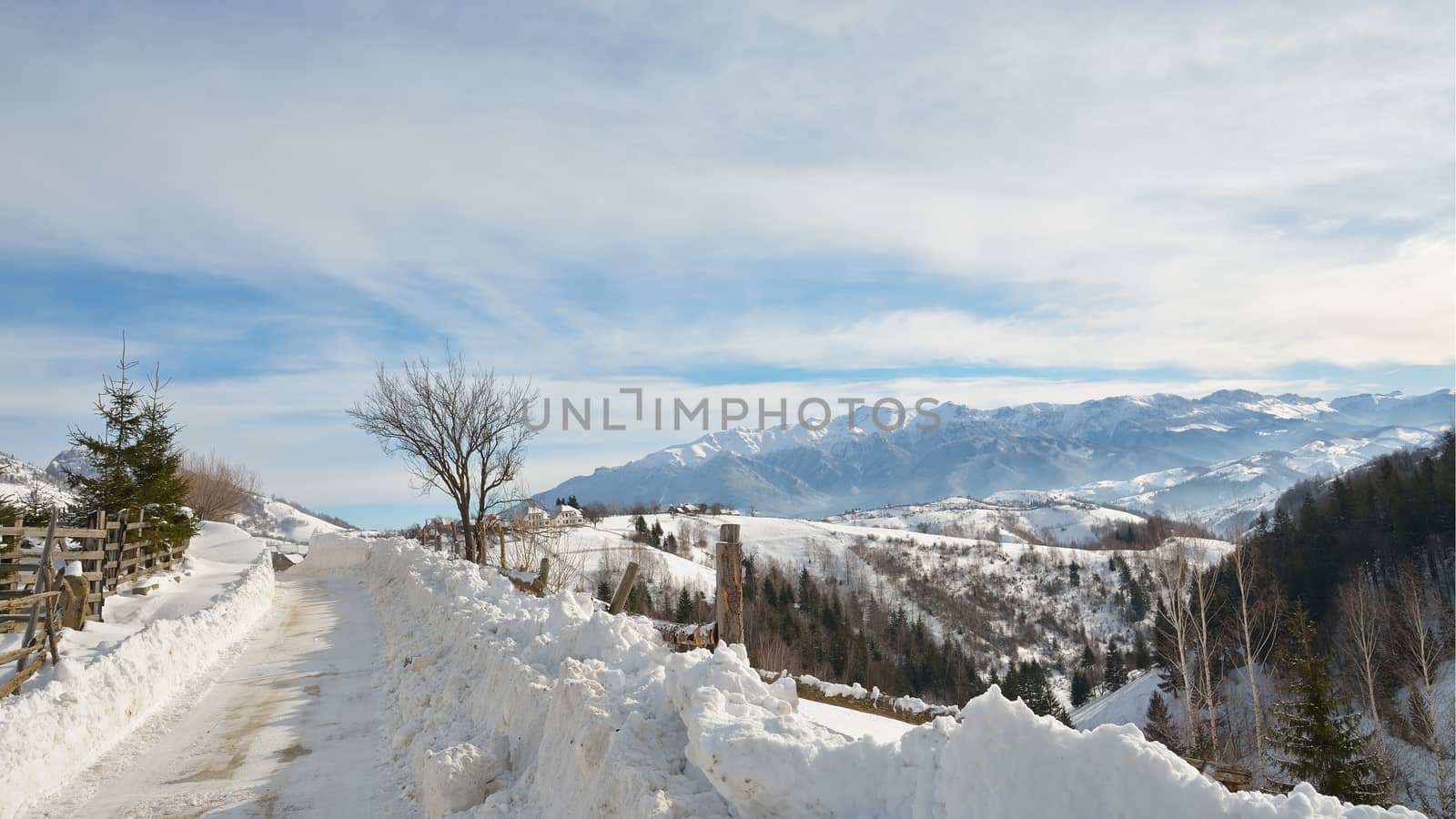 Snowy road in the village of Magura by comet