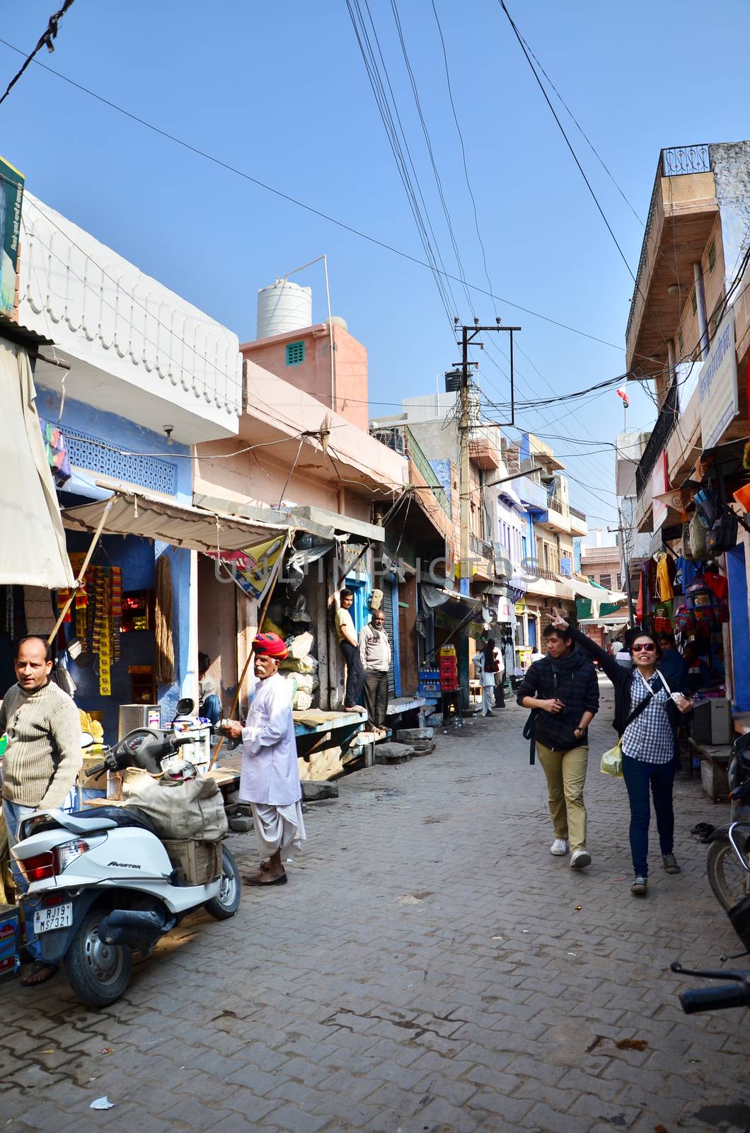 Jodhpur, India - January 1, 2015: Tourist visit traditional village in Jodhpur, India. Jodhpur is the second largest city in the Indian state of Rajasthan with over 1 million habitants.