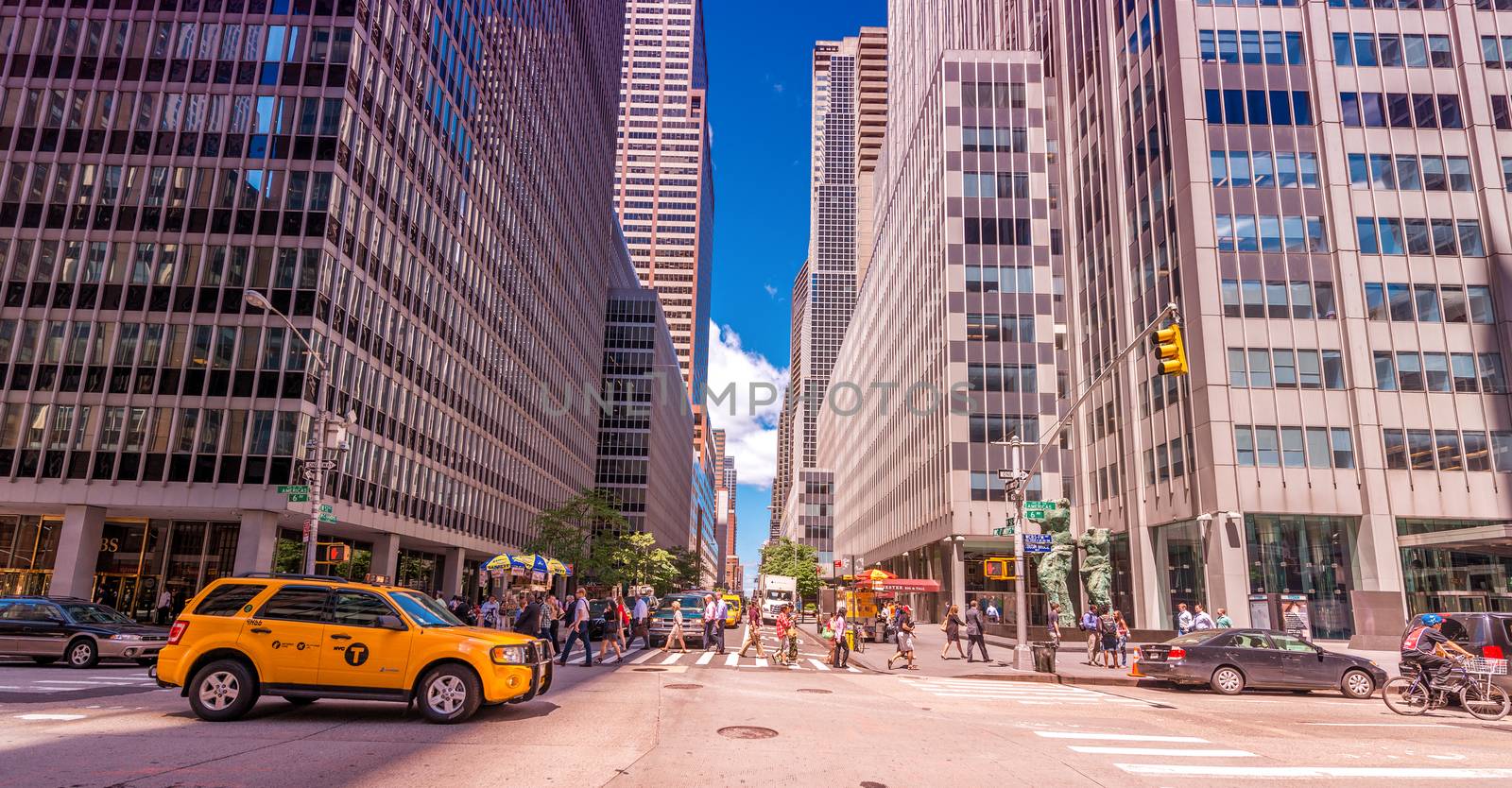 NEW YORK CITY - MAY 22, 2013: Times Square on a spring day. Approximately 330,000 people pass through Times Square daily