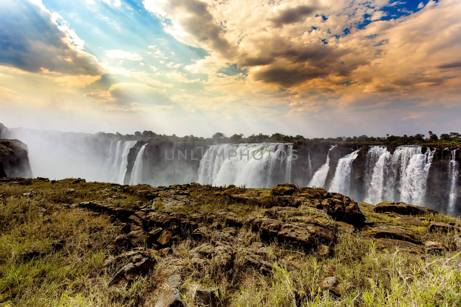 The Victoria falls is the largest curtain of water in the world (1708 meters wide). The falls and the surrounding area is the National Parks and World Heritage Site - Zambia, Zimbabwe 