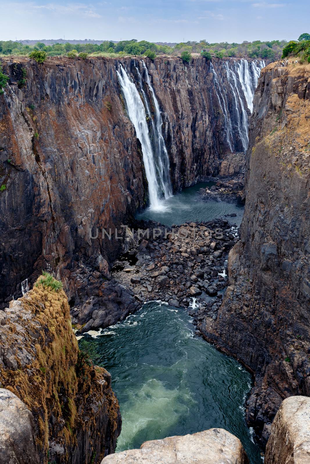 The Victoria falls is the largest curtain of water in the world (1708 meters wide). The falls and the surrounding area is the National Parks and World Heritage Site - Zambia, Zimbabwe 