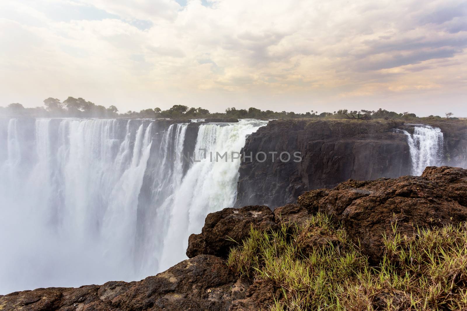 The Victoria falls is the largest curtain of water in the world (1708 meters wide). The falls and the surrounding area is the National Parks and World Heritage Site - Zambia, Zimbabwe 