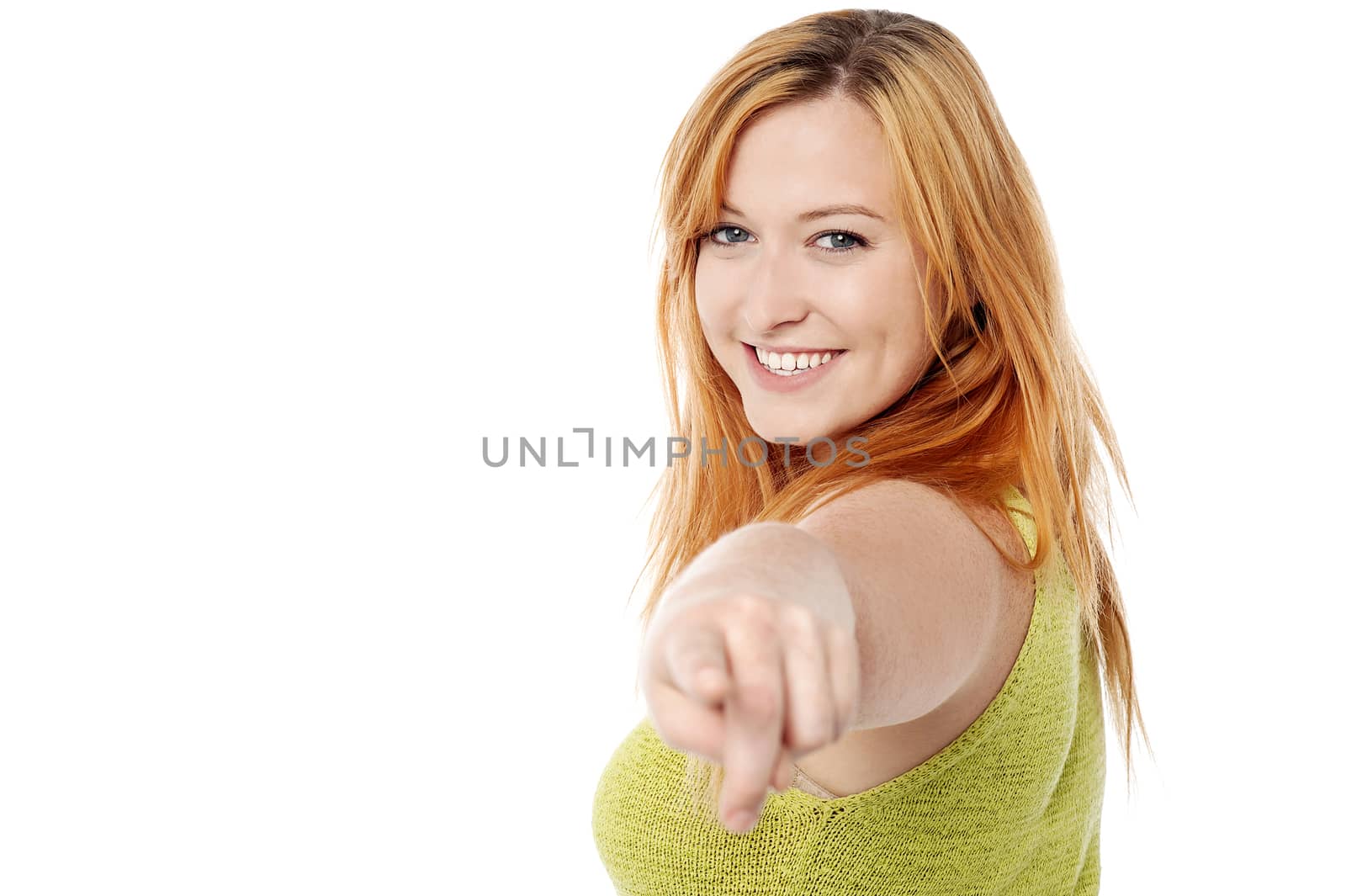 Side pose of woman pointing towards you