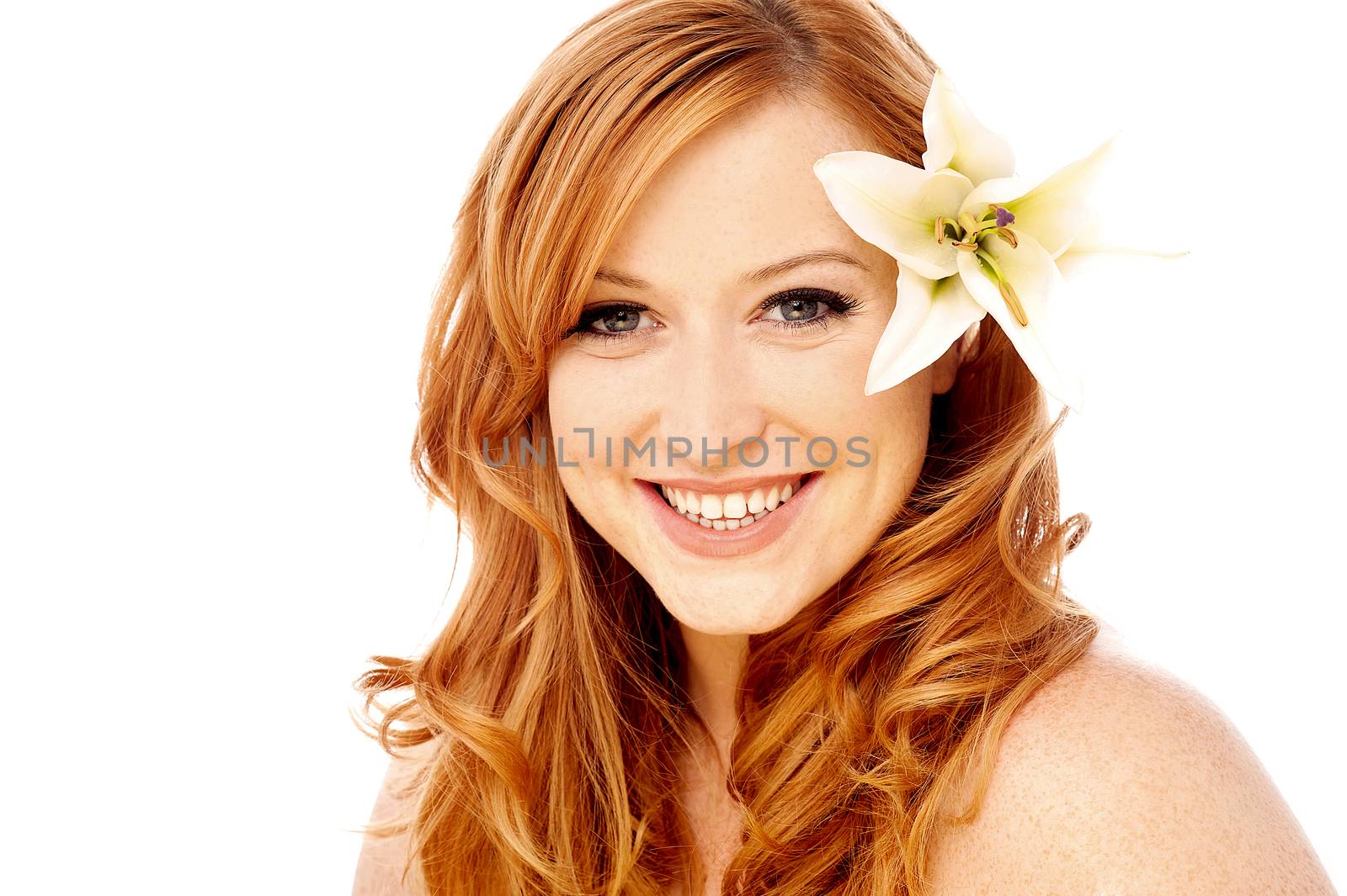 Young woman with white lily flower