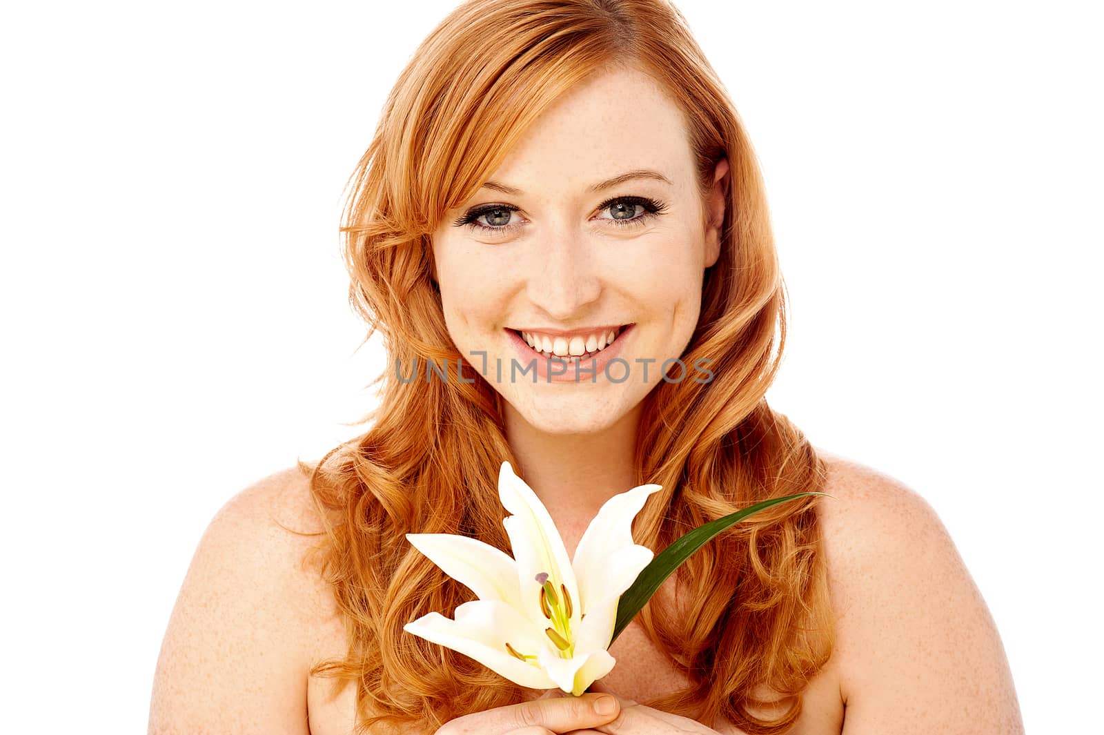 Pretty woman posing with white lily flower