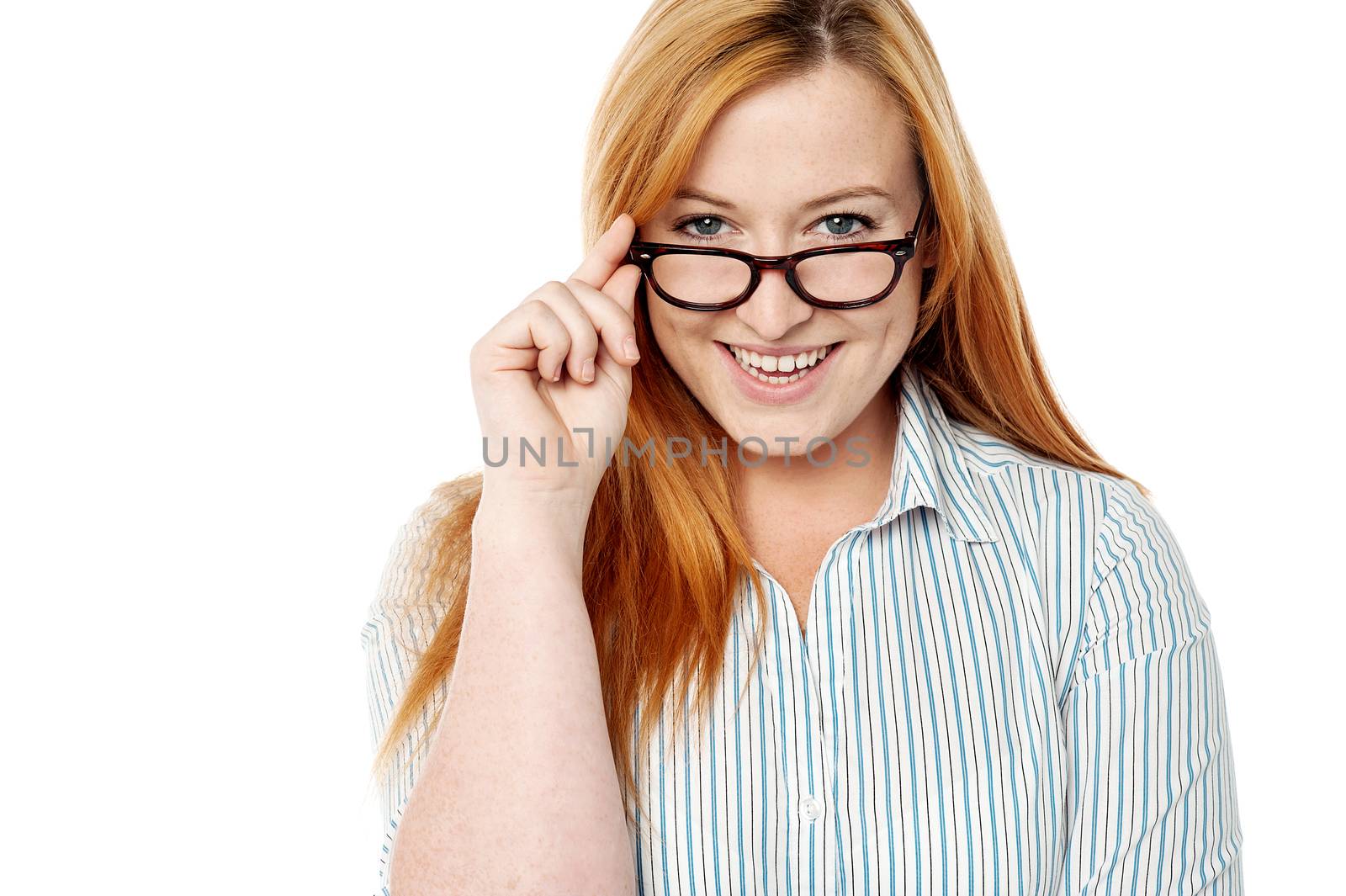 Smiling woman posing over white by stockyimages